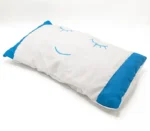 Oreiller bébé blanc motif yeux endormis bleu